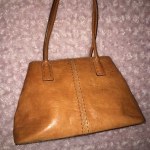 Fairly used Fossil purse. Good condition.